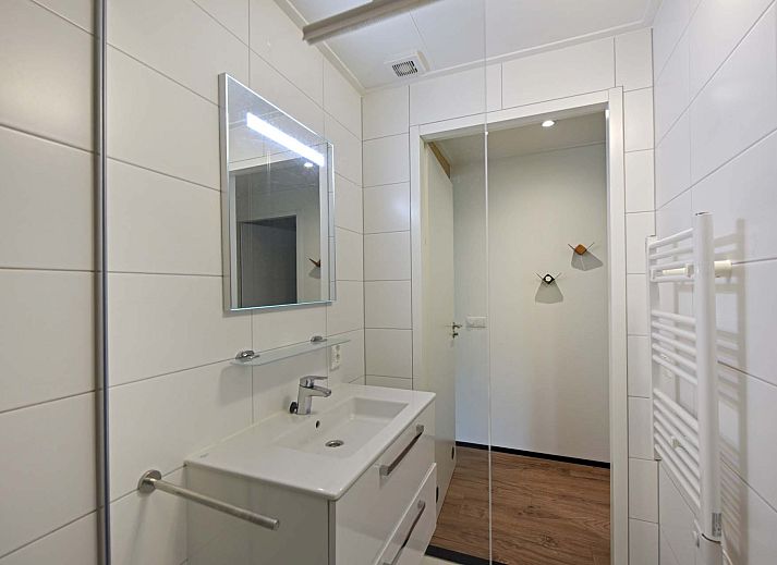 Buitenterras van Vrijstaande woning in Gulpen, omgeven door bomen in Zuid Limburg, Limburg.