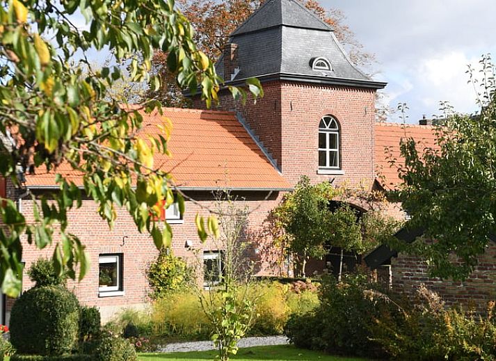Gemuetliches Wohnzimmer im Ferienhaus in Klimmen, Suedlimburg mit komfortablen Moebeln und einer gemuetlichen Atmosphaere.