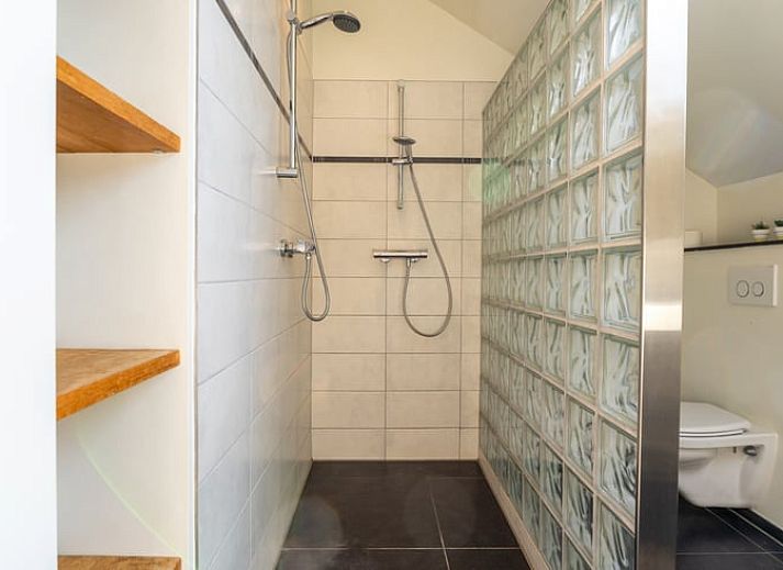 Dining room in Holiday Home in Klimmen, South Limburg, with atmospheric lighting and modern furnishings.