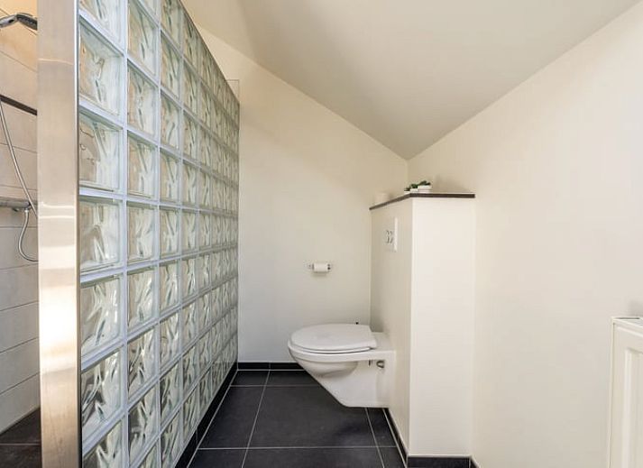 Dining room in Holiday Home in Klimmen, South Limburg, with atmospheric lighting and modern furnishings.