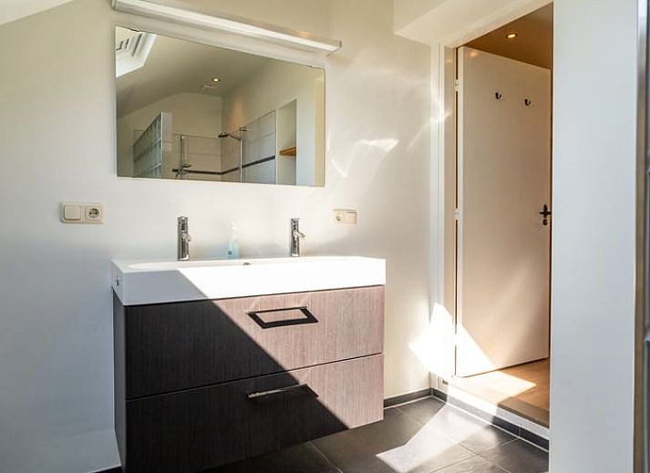 Dining room in Holiday Home in Klimmen, South Limburg, with atmospheric lighting and modern furnishings.