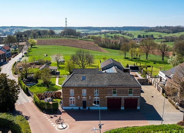 Dining room in Holiday Home in Klimmen, South Limburg, with atmospheric lighting and modern furnishings.
