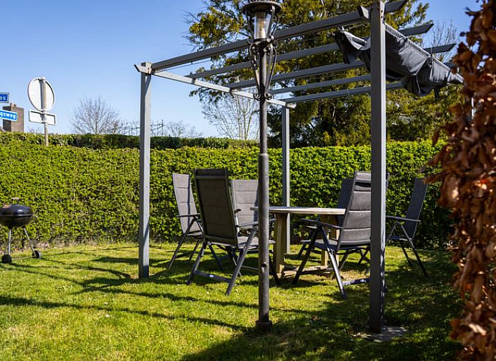 Dining room in Holiday Home in Klimmen, South Limburg, with atmospheric lighting and modern furnishings.