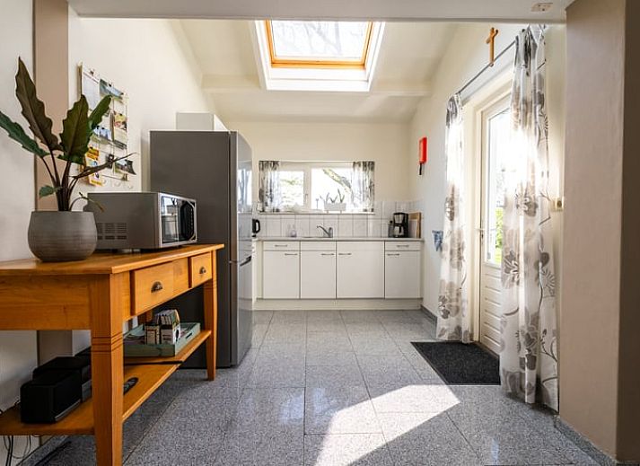 Gezellige woonkamer van Vakantiehuis in Klimmen, Zuid Limburg, met comfortabele zitruimte en eetgedeelte.