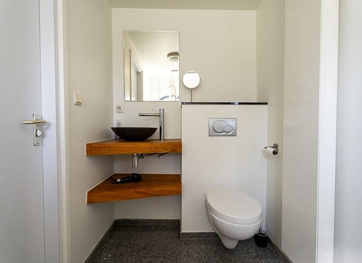 Gezellige woonkamer van Vakantiehuis in Klimmen, Zuid Limburg, met comfortabele zitruimte en eetgedeelte.