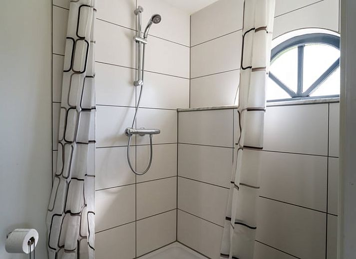 Gezellige woonkamer van Vakantiehuis in Klimmen, Zuid Limburg, met comfortabele zitruimte en eetgedeelte.