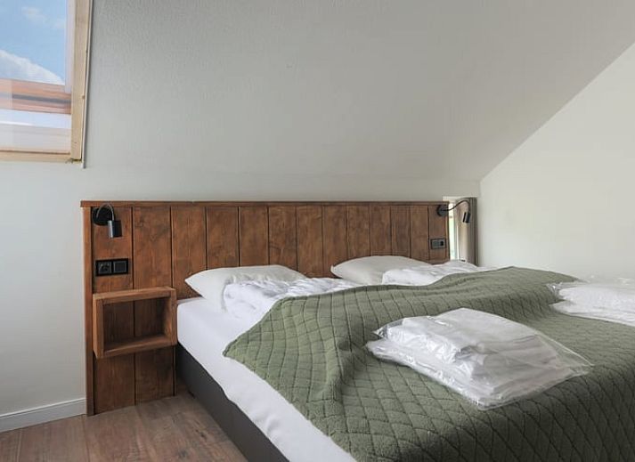 Hot tub in the garden of Holiday home in Wijlre, South Limburg, perfect for relaxation.