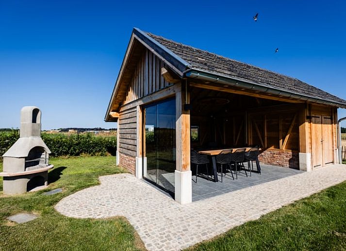Cozy living room of Holiday Home in Wijlre with comfortable sofas and natural light.