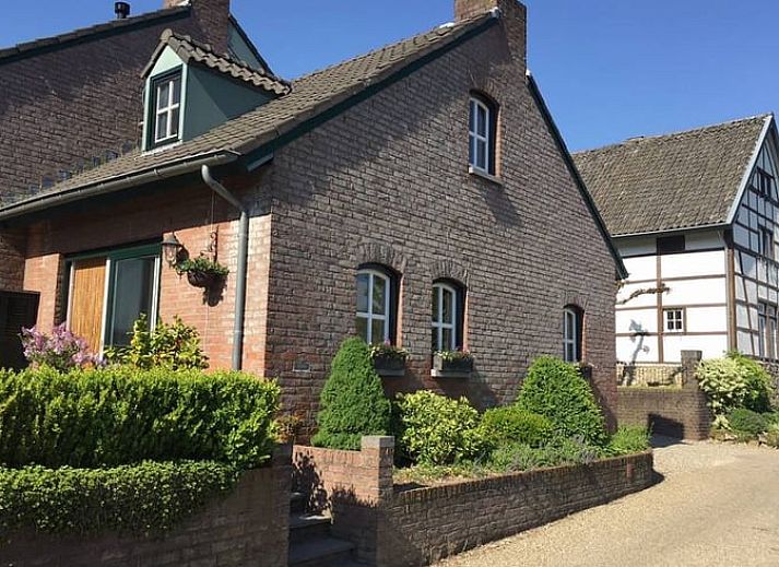 View of the landscape from Cottage in Epen, South Limburg, cottage with green hills and picturesque surroundings.