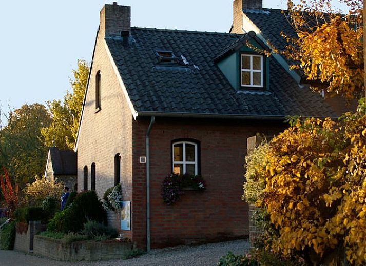 View of the landscape from Cottage in Epen, South Limburg, cottage with green hills and picturesque surroundings.
