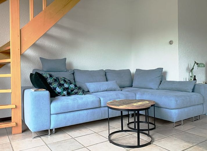 Autumn colors embrace Cottage in Epen, South Limburg, vacation home with warm bricks and cozy feel.