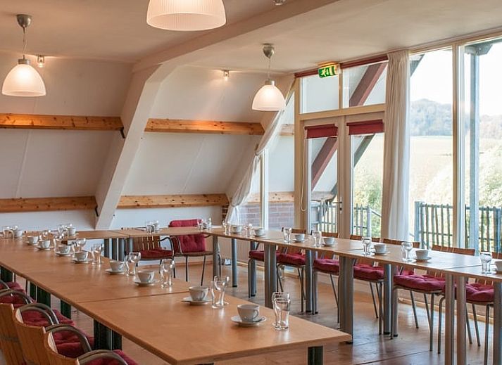 Enjoy a rustic dining experience at Holiday Home in Epen, South Limburg. Relax in the cozy interior with a view of nature.