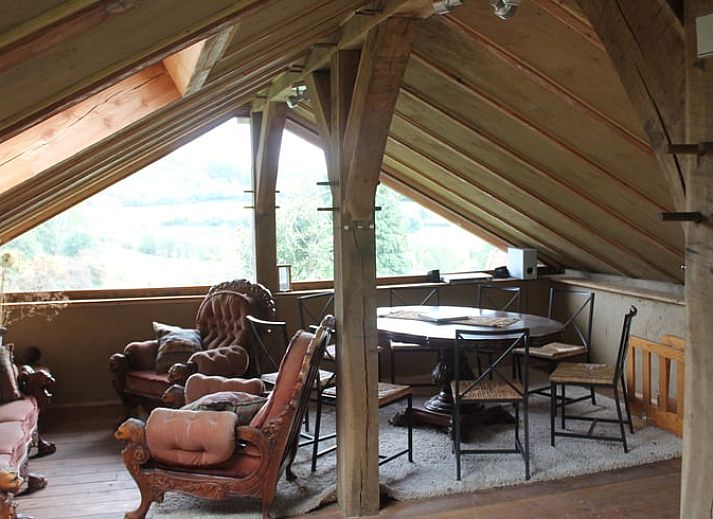 Vacation home in Vijlen, South Limburg with wooden veranda and beautiful views of the rolling countryside of Limburg.