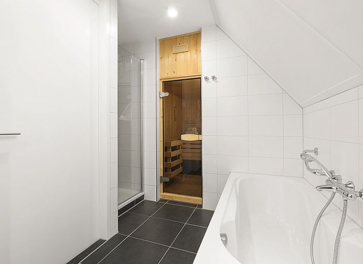 Gemuetliches Wohnzimmer in der Waufsberg 8-Personen-Villa Mets Hoes in Noorbeek, Suedlimburg mit komfortabler Sitzecke.