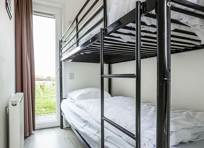 Comfortable bedroom in vacation home Green Resort Mooi Bemelen in Bemelen, South Limburg.