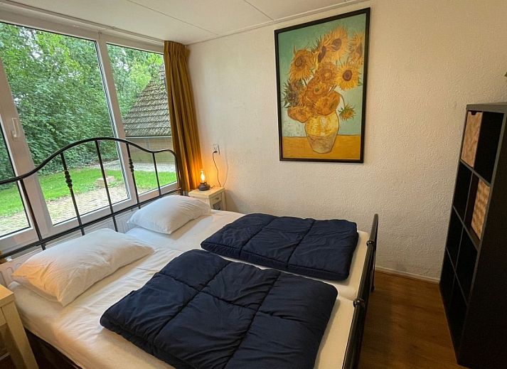 Buitenzijde van Butterflies vakantiehuis in Simpelveld, Zuid Limburg met terras en groene omgeving voor ontspanning.