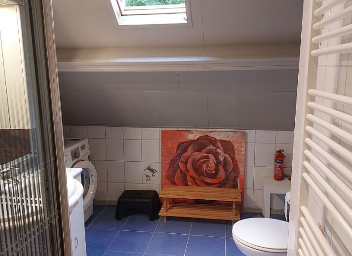 Buitenzijde van Butterflies vakantiehuis in Simpelveld, Zuid Limburg met terras en groene omgeving voor ontspanning.