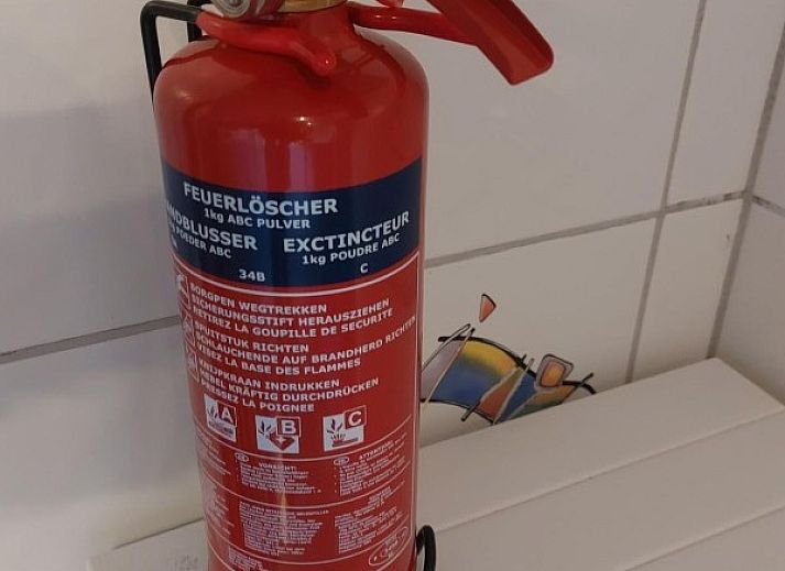 Ruime leefruimte in Butterflies vakantiehuis, Simpelveld, Zuid Limburg met uitzicht op de natuurlijke omgeving.