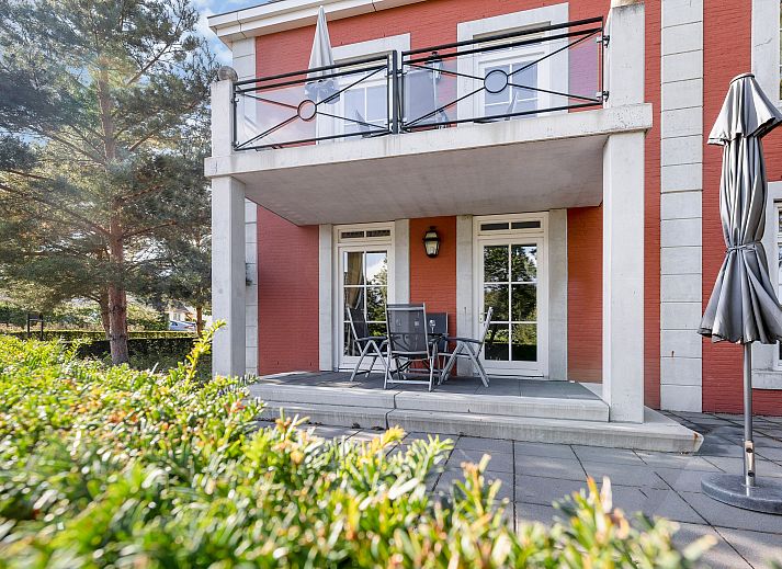 Stijlvolle woonkamer in Kasteeldomein De Cauberg appartement, Valkenburg a.d. Geul, ideaal voor ontspanning.