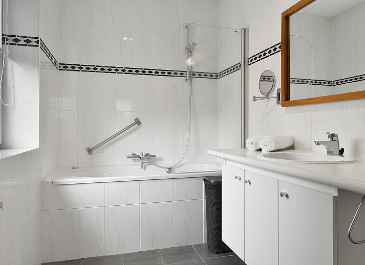 Comfortable bedroom in Kasteeldomein De Cauberg 10-person villa Culinair, South Limburg.