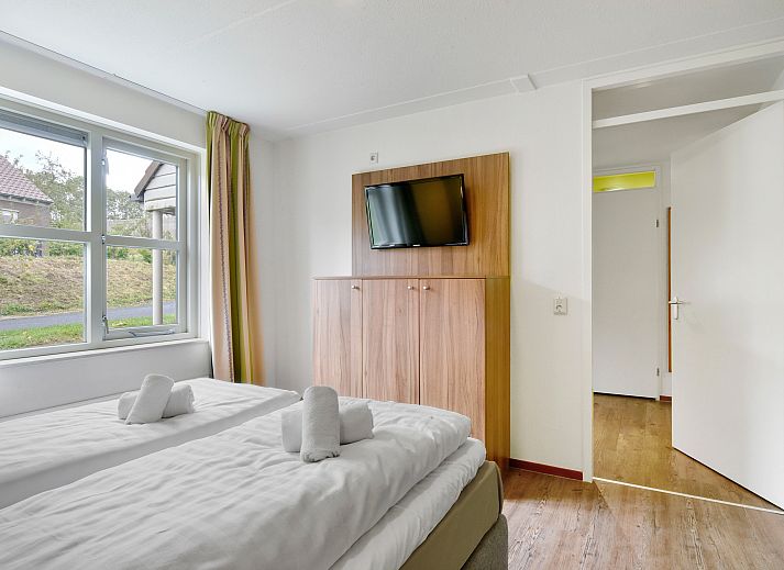 Gemuetliches Wohnzimmer des Hoog Vaals 8-Personen-Bungalows 8L1 in Limburg.