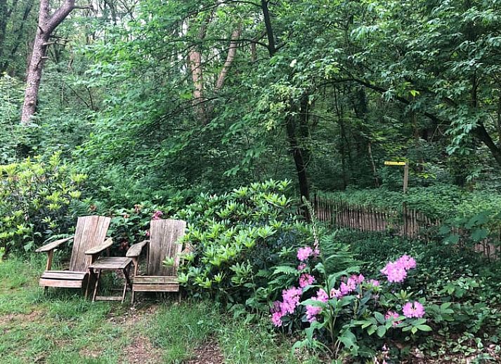 Comfortabele slaapkamer in Huisje in Mook, een uitnodigend vakantiehuis in Zuid Limburg, ideaal voor een ontspannen verblijf.