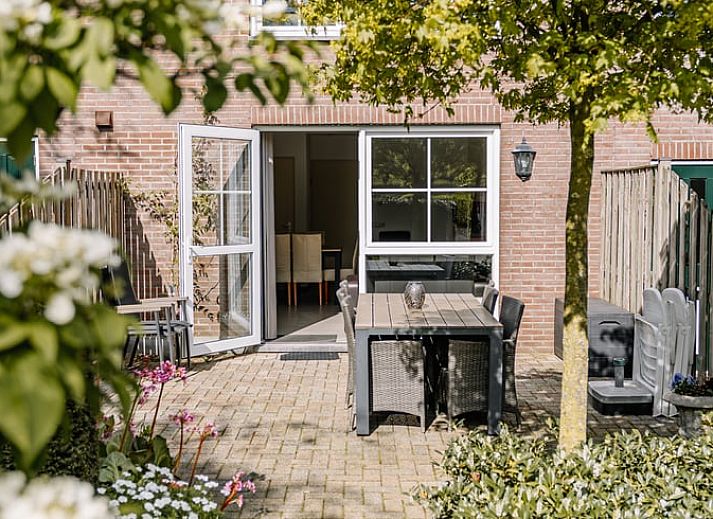Geniessen Sie den sonnigen Garten des Ferienhauses in Gulpen - Wittem, einem charmanten Ferienhaus im malerischen Suedlimburg, Limburg.