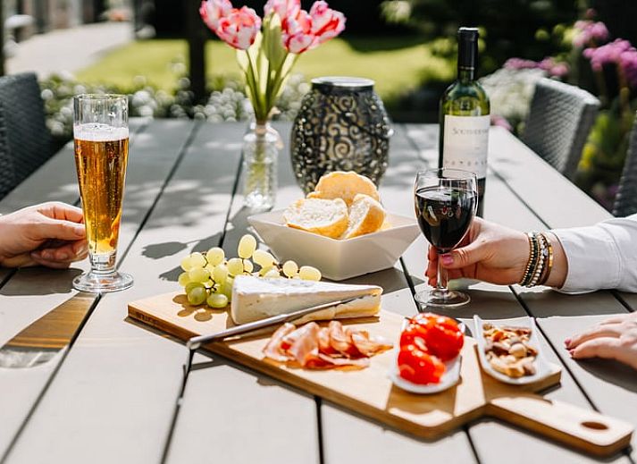 Geniessen Sie den sonnigen Garten des Ferienhauses in Gulpen - Wittem, einem charmanten Ferienhaus im malerischen Suedlimburg, Limburg.
