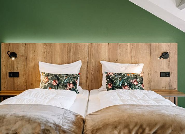 Geniessen Sie den gruenen Aussenbereich des Ferienhauses in Gulpen - Wittem, das im malerischen Suedlimburg liegt und perfekt zum Entspannen ist.