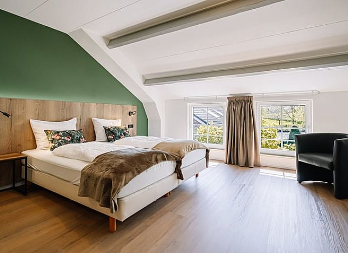 Geniessen Sie den gruenen Aussenbereich des Ferienhauses in Gulpen - Wittem, das im malerischen Suedlimburg liegt und perfekt zum Entspannen ist.