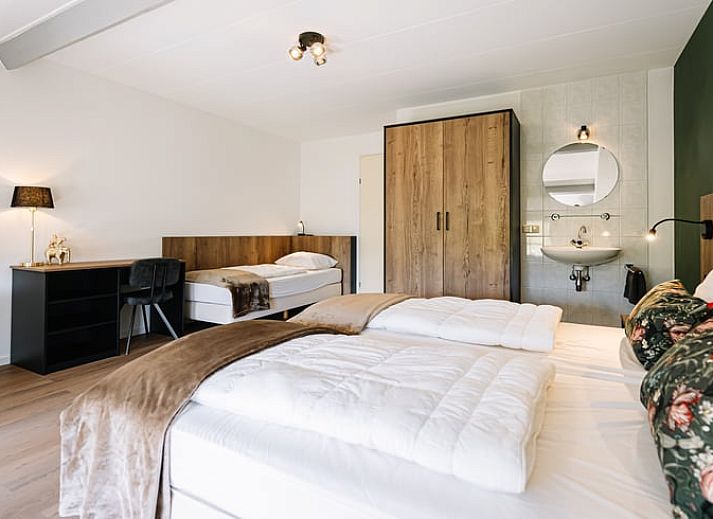 Geniessen Sie den gruenen Aussenbereich des Ferienhauses in Gulpen - Wittem, das im malerischen Suedlimburg liegt und perfekt zum Entspannen ist.