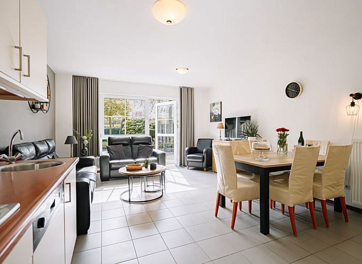 Erholsamer Garten im Ferienhaus in Gulpen - Wittem, umgeben von gruener Natur in Suedlimburg, ideal zum Entspannen.