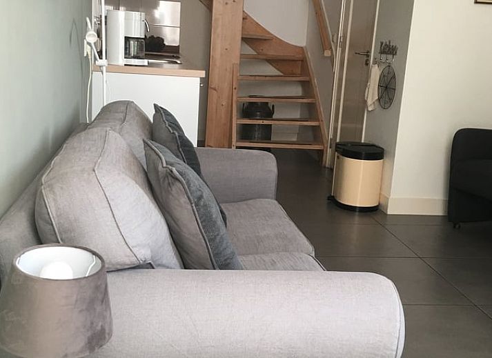 Koperen buitenlampen sieren het vakantiehuis in Scheulder, Zuid Limburg.