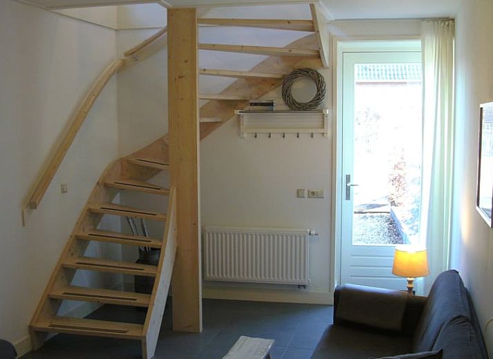 Detail van buitenmuur met koperen lampen bij Vakantiehuisje in Scheulder, Zuid Limburg.