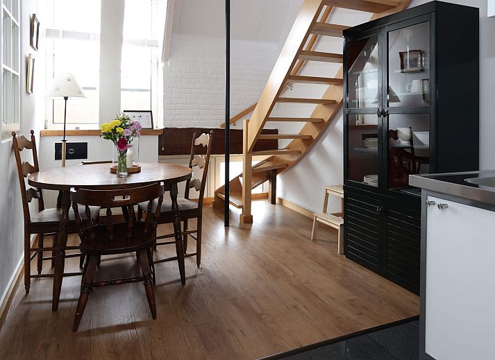 L173 vakantiehuis in Sittard, Zuid Limburg, met een charmante bakstenen gevel en zonnepanelen op het dak.