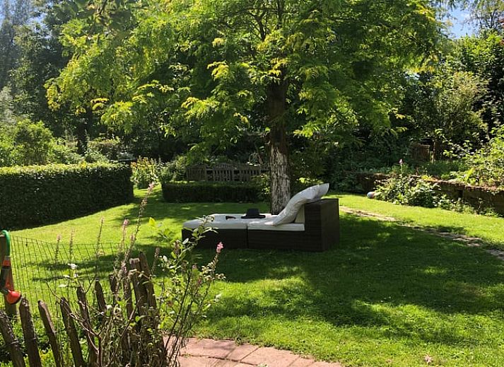 Das Ferienhaus in Beutenaken, Limburg, bietet rustikalen Charme und eine gruene Umgebung in Suedlimburg.
