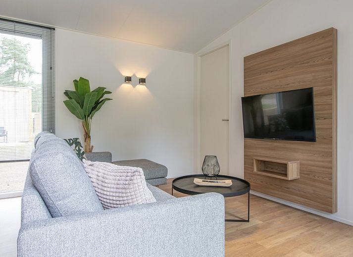 Timber Cottage 4 in Mierlo, North Brabant offers a rustic cottage with veranda, surrounded by the serene nature of De Peel.