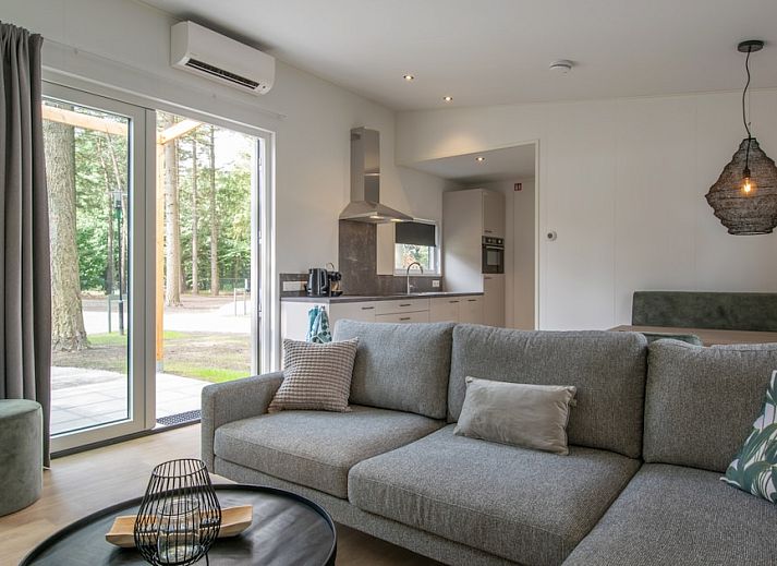 Timber Cottage 4 in Mierlo, North Brabant offers a rustic cottage with veranda, surrounded by the serene nature of De Peel.