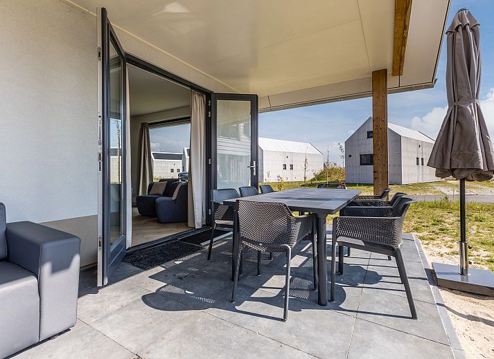 Stijlvolle zithoek in vakantiehuis 10-persoonsbungalow 10EL, Someren, Noord Brabant.