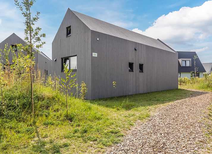 Stilvolles Wohnzimmer des 4-Personen-Hauses 4B5 in Someren, De Peel, mit gemuetlicher Sitzecke.