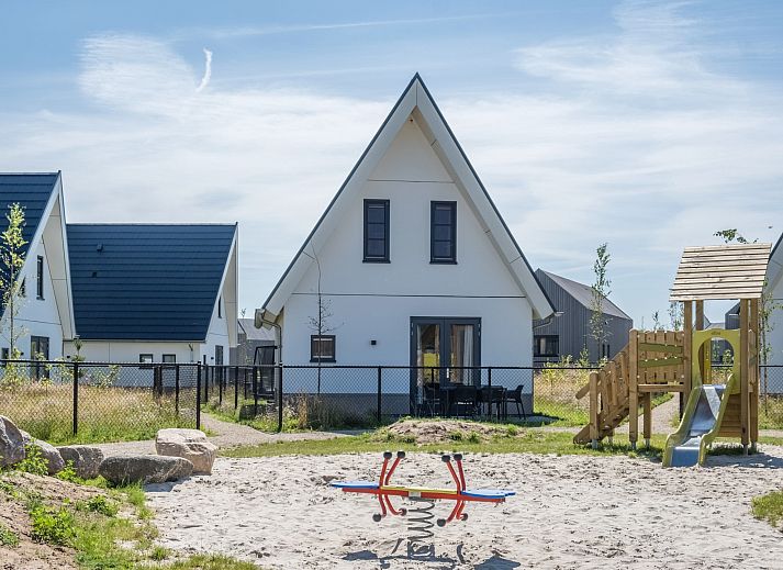 Cozy sitting area in 6-bed bungalow 6CK in Someren, De Peel, North Brabant overlooking garden.