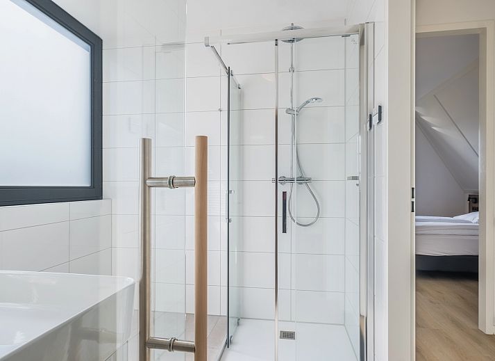 Gezellige zithoek in 6-persoonsbungalow 6L2, Someren, De Peel, Noord Brabant met uitzicht op de tuin.