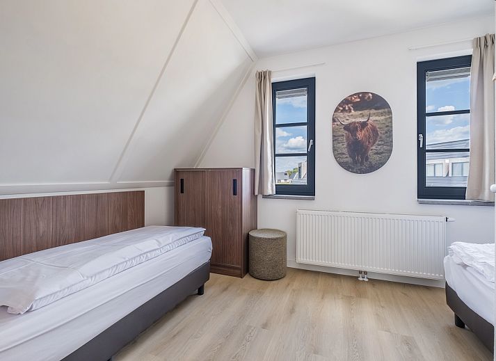 Stijlvolle leeshoek in 6-persoonsbungalow 6L2, Someren, De Peel, Noord Brabant met uitzicht op de omgeving.