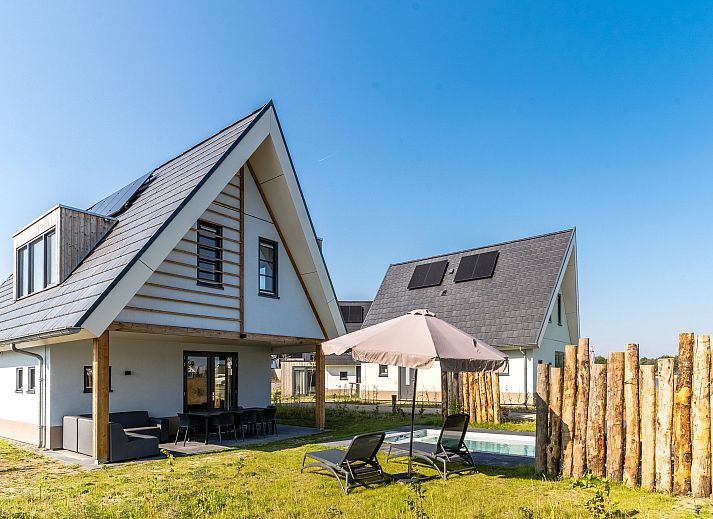 Stijlvolle woonkamer van 8-persoonsbungalow 8ELZ in Someren, De Peel, Noord Brabant.