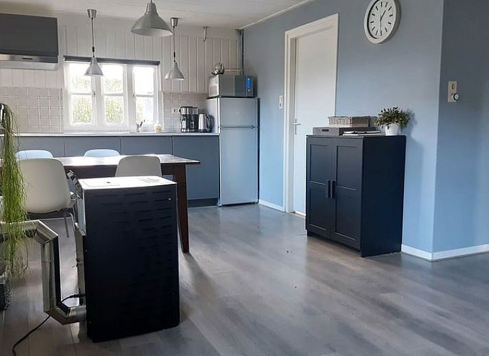 Vakantiehuisje in Aarle-Rixtel, Noord Brabant, met zonnig terras en uitzicht op het platteland.