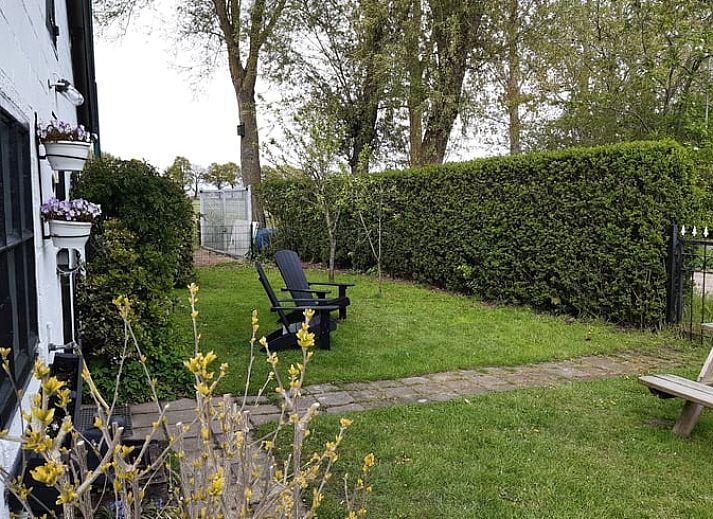 Stijlvolle woonkamer van Vakantiehuisje in Aarle-Rixtel, De Peel, met moderne inrichting.