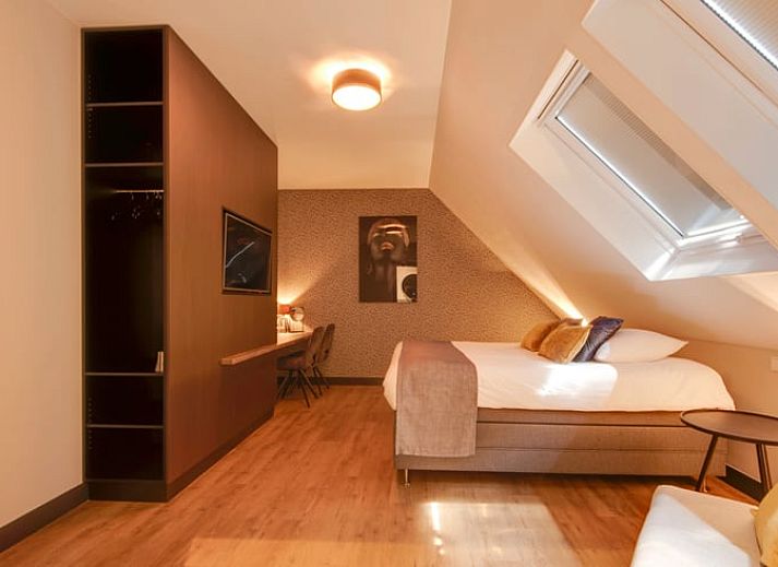 Luchtfoto van Vakantiehuisje in Milheeze met groene tuin in De Peel, Noord Brabant.