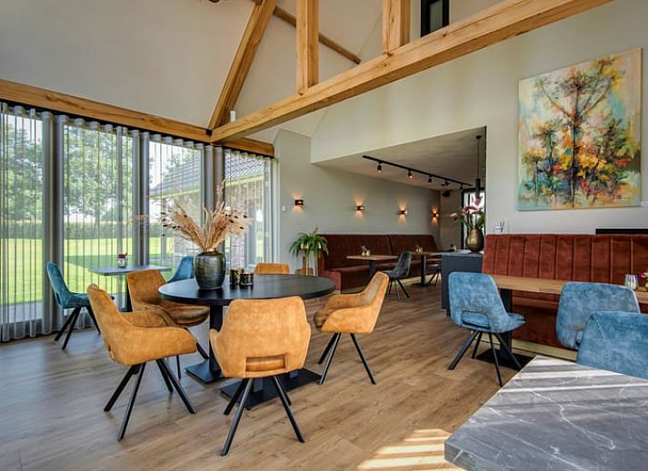 Attractive bedroom in Holiday Home in Milheeze, North Brabant with luxurious bed and soothing furnishings.