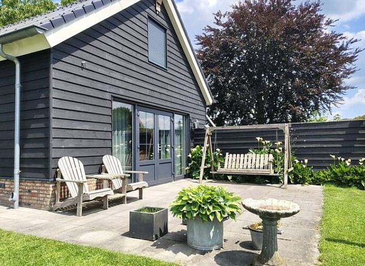 Charming cottage in Zeeland with sunny terrace and green garden in De Peel, North Brabant.