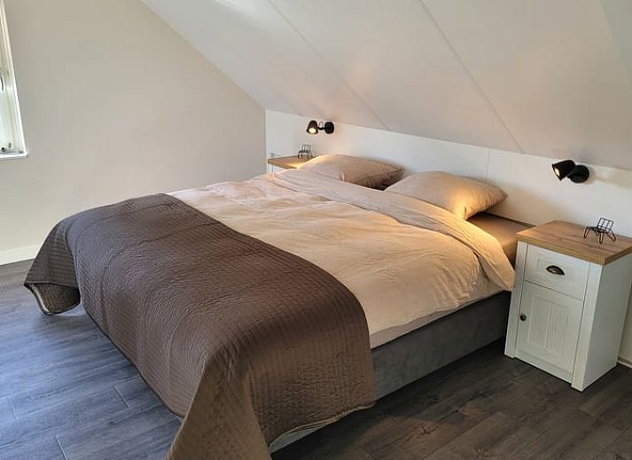 Spacious terrace at Cottage in Zeeland with seating and green surroundings in De Peel, North Brabant.